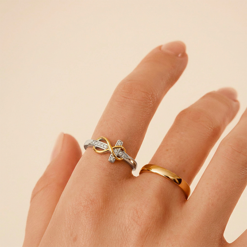 Bague croix infini dorée et argentée