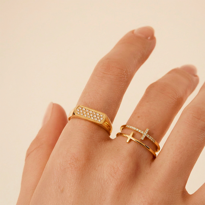 Bague croix ajustable portée, dorée