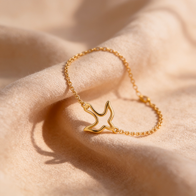 Bracelet colombe Esprit-Saint dorée