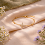 Bracelet croix strass dorée