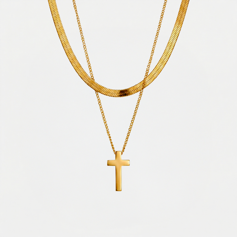 Collier croix double chaîne, finition dorée