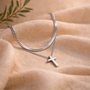 Collier croix double chaîne argentée