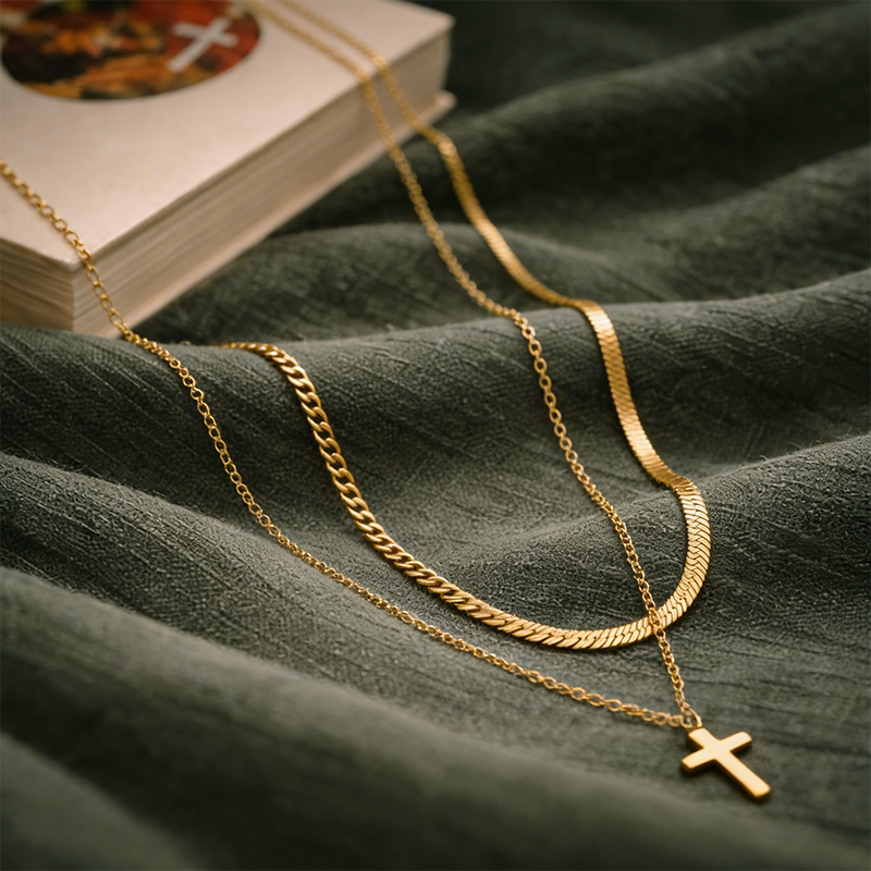 Collier croix double chaîne dorée