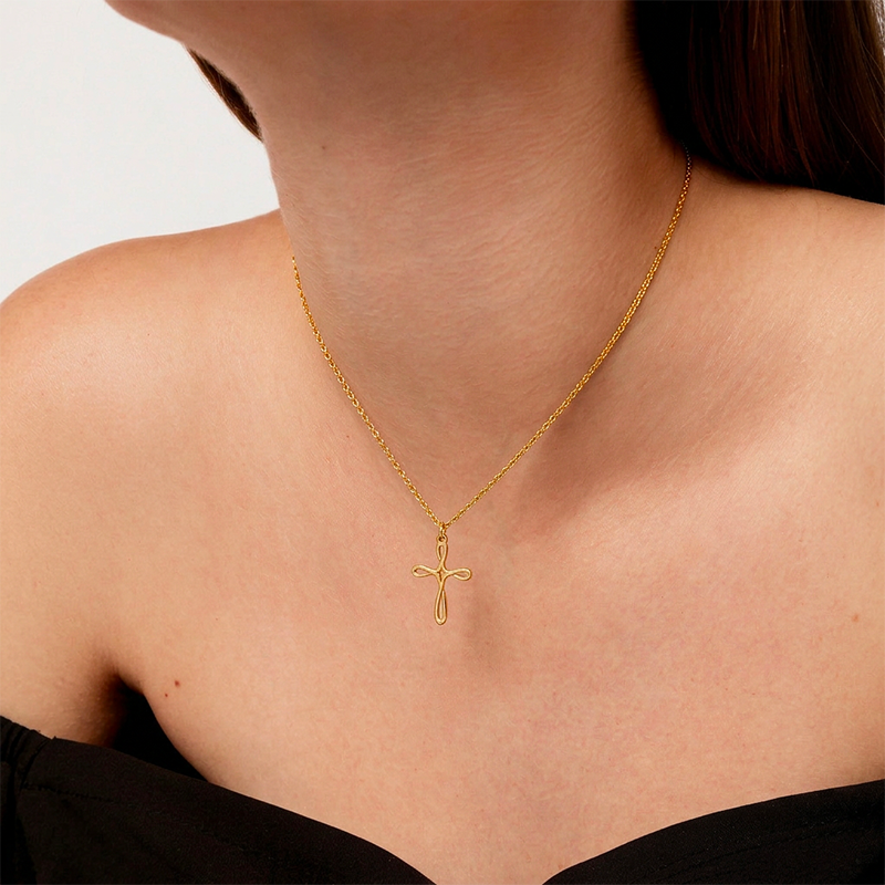 Collier croix fantaisie dorée