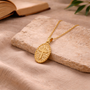 Collier médaille croix dorée
