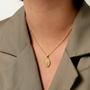 Collier médaille croix dorée