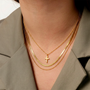 Collier multirang croix dorée