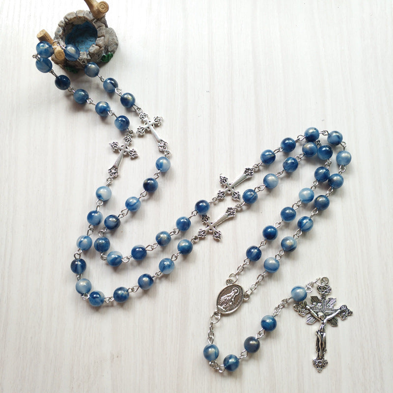 Chapelet bleu à croix, grains marbrés